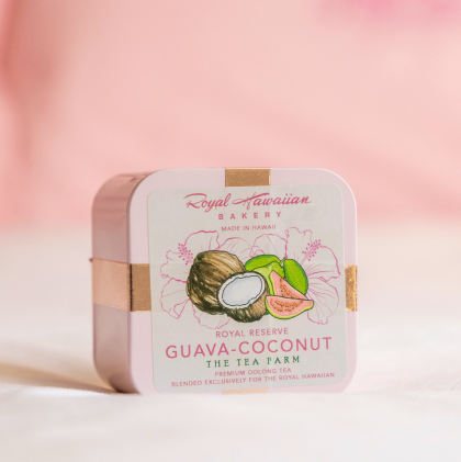 A gift box of Royal Hawaiian Original Tea decorated with guava and coconut illustrations.