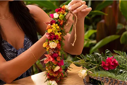 A photo of floral lei making