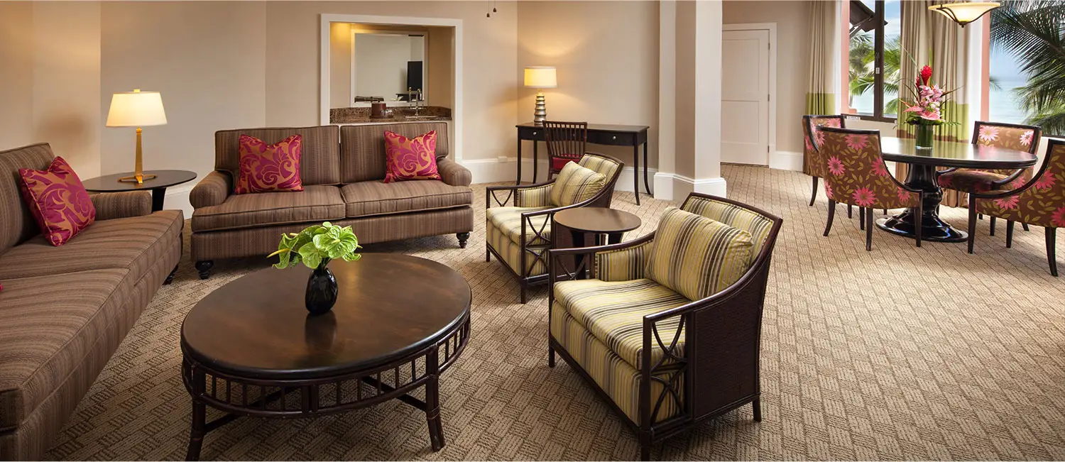 Classic bedroom with views of the tropical garden outside.